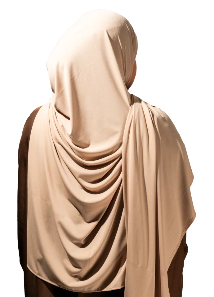 Mannequin portant un tissu jersey premium beige, vue d'ensemble sur le tombé et la coupe.